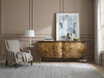 Featherington Commode styled beneath framed art in a contemporary classic room