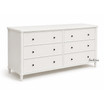 An angled view of the Brynmore 6 Drawer Chest in White displaying the six spacious drawers, perfect for Hamptons-inspired or modern bedroom or living room spaces.