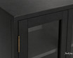 Contemporary black media unit sideboard with glass shelving, detailed close up view.