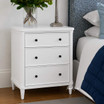 White three drawer bedside table styled for coastal and Hamptons homes