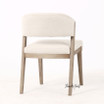 Designer oak dining chair with textured linen fabric and contemporary form