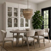 Upholstered curved back dining chair perfect for Hamptons or warm minimalist dining settings