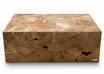 Warm minimalist rectangular teak root table with natural organic crevices,