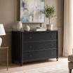 Traditional black chest of drawers with understated round metal knobs