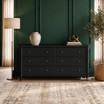 Contemporary black chest of drawers with generous storage in a warmly styled textured modern living room