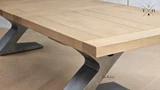Quinn's sleek extendable table, designed for contemporary spaces, offers unmatched versatility.