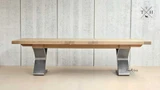 Maximize space with Quinn's stylishly extendable dining table, featuring a unique metal base.