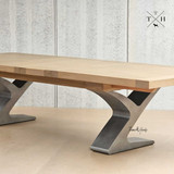 Quinn's extendable table: a centerpiece for all occasions, combining elegance with practical design.