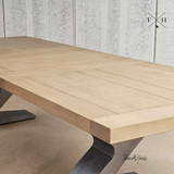 Chic and functional, Quinn Double Extension Dining Table extends to accommodate more guests, blending style and utility.