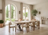 Quinn double extendable dining table with natural timber top and metal base, styled with eight dining chairs in a light Mediterranean interior.