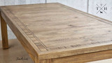 Texture of the natural oak on the tabletop, showcasing quality and elegance