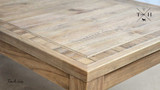 Close-up showcasing the texture and finish of the oak tabletop