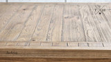 Side view of the table surface, emphasizing the oak’s texture and finish