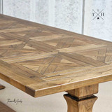 Detailed close-up of the hand-crafted parquetry top, showcasing the intricate wood patterns