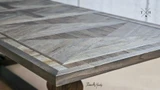 Corner view of the extendable dining table, focusing on elegance and design
