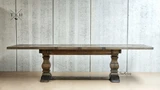 Full frontal view of the Darcy Oak Parquetry Extendable Dining Table, displaying its classic elegance