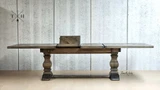 The table with the extension mechanism in mid-action