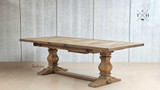 The table in its fully compact form at 210cm, emphasizing space efficiency