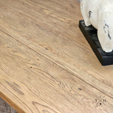 Close-up of the coffee table’s solid oak surface, highlighting the rich wood grain and natural beauty, ideal for elegant lounge settings