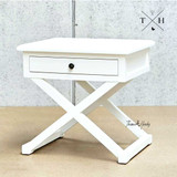 Side view of the bedside table, emphasizing its linear profile and x-base cross-leg detailing.