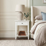 Close-up of the Hampstead 1 Drawer Bedside Side Table in white featuring a single drawer, cross-frame side panels, open shelf and classic Hamptons styling.