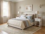 Pair of Hampstead 2 Drawer Bedside Side Tables in white styled with matching table lamps beside a contemporary bed in a bright Hamptons-inspired bedroom.