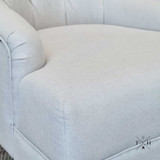 Avery Armchair Seat Detail: Highlighting the comfortable cushioning and natural cream linen-blend fabric