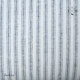 Detailed shot of the blue and white ticking stripe linen fabric