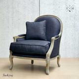 Diagonal perspective of the black armchair, highlighting craftsmanship and elegant design