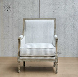 Front perspective of the Pembroke Armchair showcasing blue and white stripe upholstery