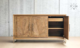Open door of the Darcy Oak Buffet/Sideboard, displaying its capacity and sturdy build