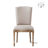 Front view of the Knightbridge Dining Chair, showcasing the French provincial design and natural linen upholstery.