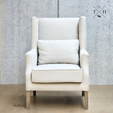 Front angle of the Brereton Wingback Chair in cream linen