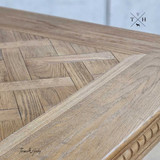 Close-up focusing on the finish of the Bedford Oak Dining Table, showing its quality and patina