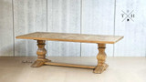 Side angle view of the Darcy Oak Table, emphasising its length and solid construction