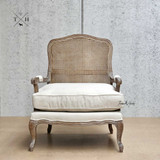 Front view of the armchair without the seat cushion.