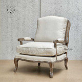 Front diagonal perspective, showcasing the natural linen upholstery and Provincial silhouette
