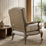 Beautifully crafted weathered oak armchair with rattan back and tailored upholstery