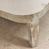 Image showing the weathered oak legs, accentuating the chair's rustic charm.