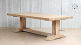 Full-length view of the Charlested Oak Dining Table, showcasing its elegant proportions and classic design