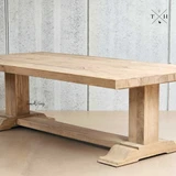 The Charlested Oak Dining Table in full view, showcasing its classic design and sturdy oak construction.
