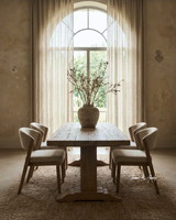 Side Profile view of the Charlested Oak Dining Table in a contemporary home