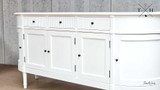 Image capturing the symmetrical design of the Louis Buffet’s front, emphasizing elegance