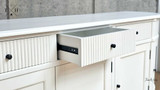 Inside view of an open drawer in the Louis Buffet with metal runner, showcasing its spaciousness and build quality