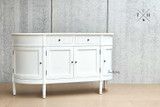 Stand-alone side profile of the Louis Buffet Petite, showcasing its height and design.