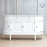 Image capturing the symmetrical design of the Louis Petite Buffet’s front, emphasising elegance