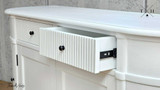 Inside view of an open drawer in the Louis Petite Buffet with metal runner, showcasing its spaciousness and build quality