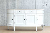 Front view of the Louis Petite Sideboard showcasing its elegant design and modern finish