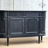 Image capturing the symmetrical design of the Louis Petite Buffet’s front, emphasising elegance