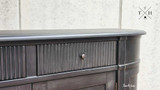 Detailed close-up of the intricate grooved detailing on the drawers of the Louis Petite Buffet.